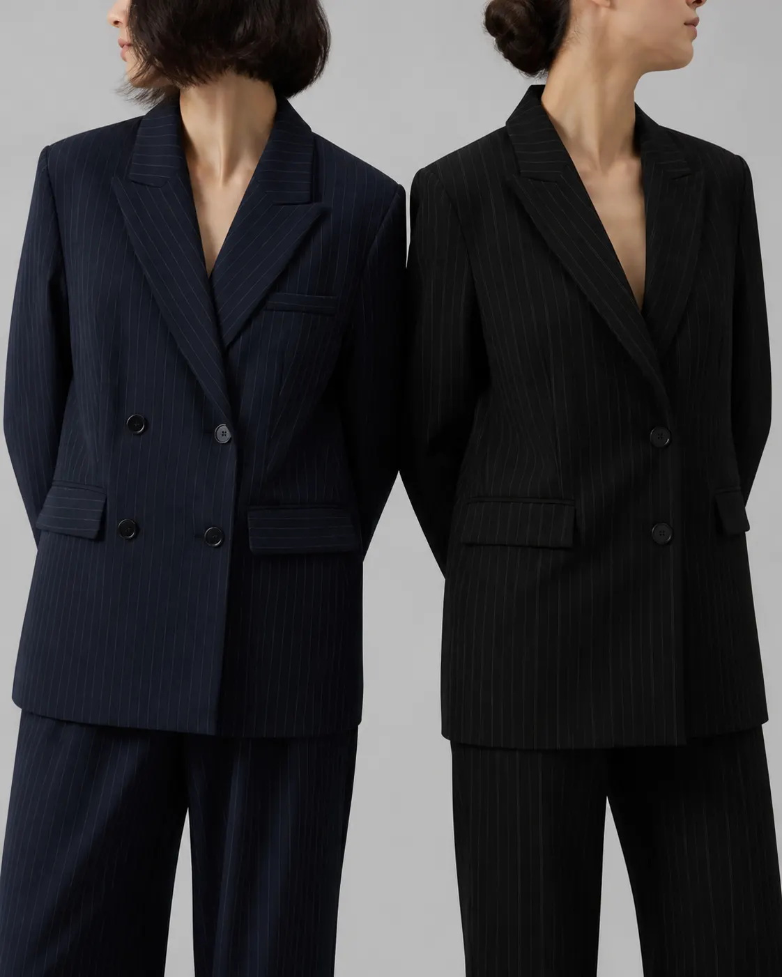 Lacivert kruvaze ve siyah iki düğmeli çizgili blazer karşılaştırması